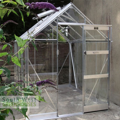 6x4 greenhouse with polycarbonate glazing on concrete
