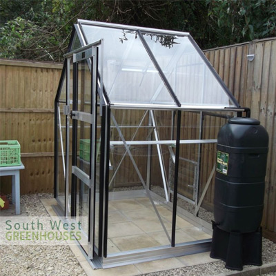 6x4 silver aluminium greenhouse on slabs