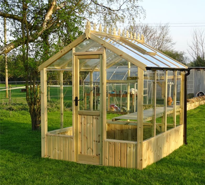 light coloured wooden greenhouse