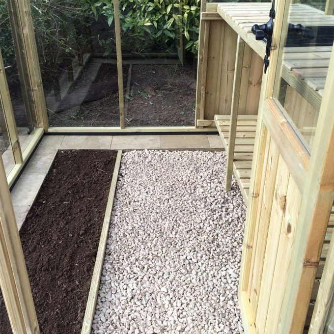 inside a potting shed floor with shelving