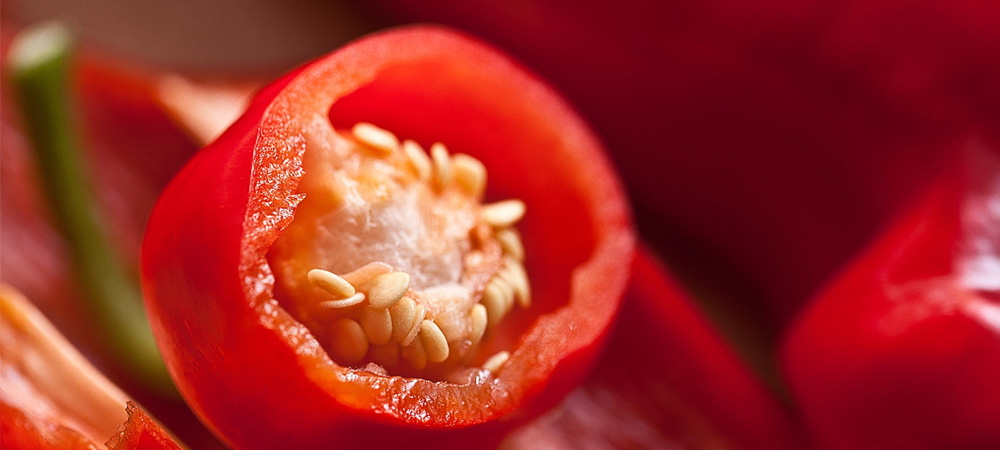 chilli chopped in half with seeds showing