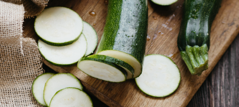 chopped courgettes on a chopping board