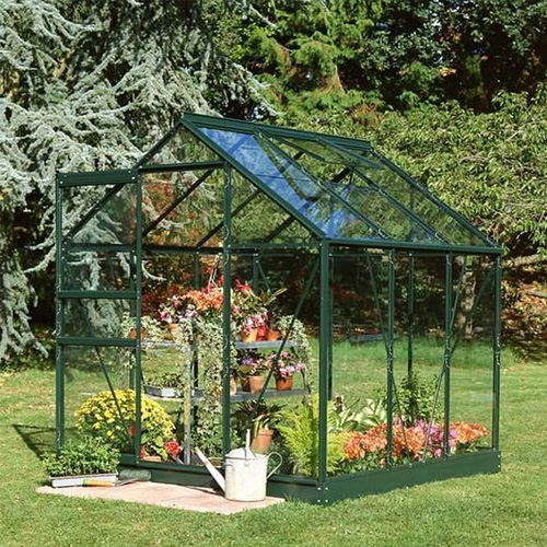 halls freestanding greenhouse green on lawn