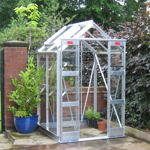 small aluminium greenhouse on patio