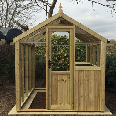 victorian styled wooden potting shed